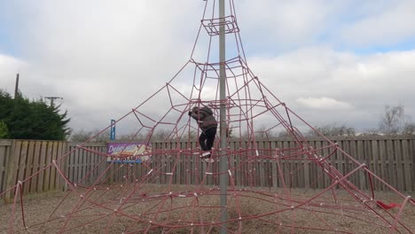 Children-climbing-and-having-fun-at-a-playground-designed-for-kids