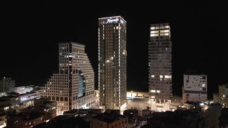 A-renewed-exterior-view-of-the-famous-Beit-Opera-Tower-and-the-surrounding-buildings-from-Tel-Aviv-Beach