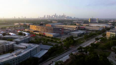 Aerial-view-over-the-TDECU-stadium,-golden-hour-in-Houston,-Texas,-USA