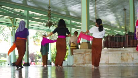 Group-of-people-practice-performing-classic-traditional-dance-performance-on-the-floor