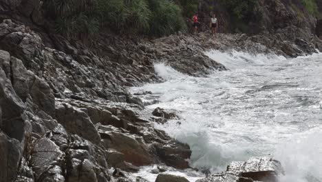 rough-Waves-Crash-On-Rocky-Seacoast-In-Dam-Trau-Beach,-Vietnam