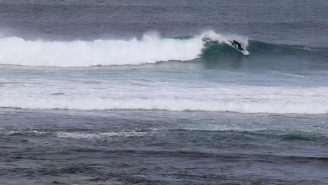 Surfer-Takes-On-Wave-At-Surfers-Point-Margaret-River,-Western-Australia