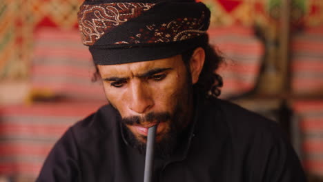 Front-Portrait-Of-A-Jordanian-Man-Smoking-Medical-Marijuana-In-Jordan