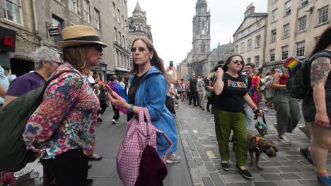 POV-shot-of-walking-into-a-pride-march-along-Edinburgh-Royal-Mile