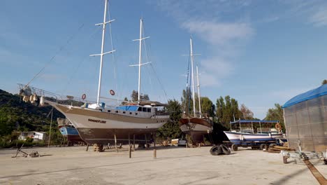 Yachts-in-dry-dock-boatyard-marina-for-winter-maintenance,-Simena,-Turkey