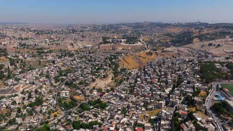 Jerusalem-old-city-rooftops-and-The-Dome-of-The-Rock,-Aerial-view