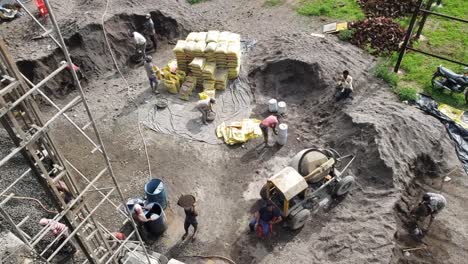 Top-view-of-the-construction-works-on-the-roof-of-a-multi-story-building