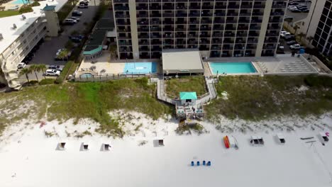 Aerial-view-of-Henderson-Beach-state-park,-Destin,-Florida,-United-States-and-coastline-with-colorful-cloud-and-blue-sky