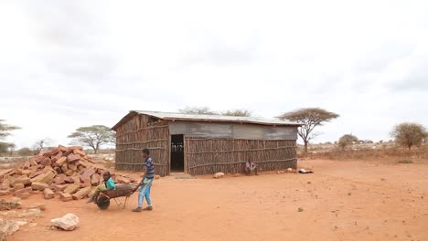 Africa,-Kenya,-Kenyan-Somali-border---Two-Kenyan-children-play-in-a-poor-village-on-the-border-between-Kenya-and-Somalia---August-21,-2018