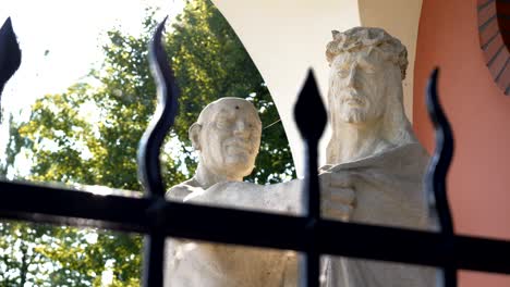 Statue-of-Jesus-with-the-cross,-Station-of-the-Cross-in-Gietrzwałd