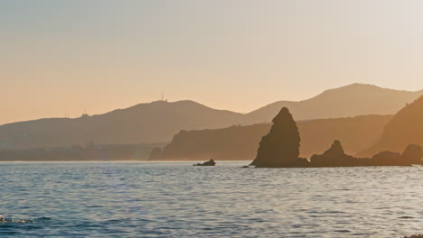 Rocky-coastline-of-Playa-de-las-Alberquillas-during-sunset