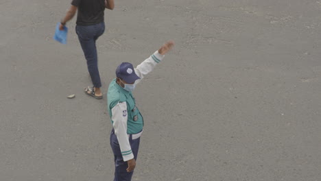 Traffic-police-handling-traffic-on-street-Dhaka-city-traffic-police--Bangladeshi-police-man-4k-ProRes-HQ