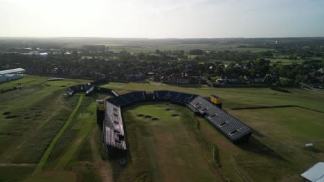 Preparations-for-The-2023-Open-at-Royal-Liverpool-Golf-Club,-Wirral,-UK---Aerial-drone-18th-green-anti-clockwise-close-pan