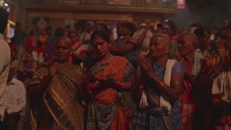 Elderly-local-Indian-women-in-traditional-dress-being-entertained