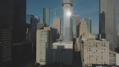 An-aerial-establishing-shot-from-the-center-of-downtown-Houston-featuring-811-Main,-609-Main,-JPMorgan-Chase-Tower,-Wells-Fargo-Bank-Plaza,-One-Shell-Plaza,-and-Texas-Tower-in-Houston-Texas