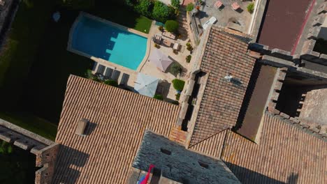 Top-down-aerial-view-of-Chateau-de-Pouzilhac,medieval-gem-with-timeless-elegance