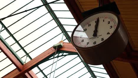 Electric-clock-mounted-in-the-hall-of-Masaryk-railway-station,-Prague