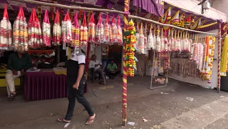 pov-shot-A-lot-of-people-put-flower-garlands-and-the-flowers-look-like-a-desert