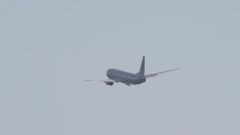 Zoom-Shot-of-P-8-Poseidon-Flying-in-Slow-Motion