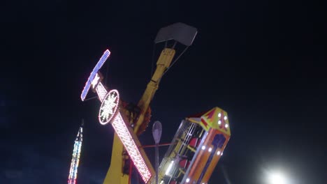 A-Kamikaze,-also-known-as-a-Double-Arm-Ranger,-The-Apollo,-Skymaster,-scissors-and-Sky-Flyer,-is-a-pendulum-amusement-ride,-found-at-most-of-mexican-funfairs