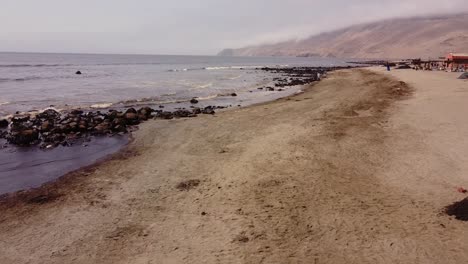 Tourist-walk-on-the-beach-and-approach-to-contaminated-sea