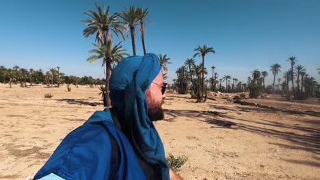 Camel-ride-in-the-desert---palm-trees