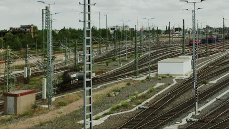 Medium-shot-Pan-of-GATX-tank-wagon-on-train-formation-or-fiddle-yard-which-rolls-to-designated-track