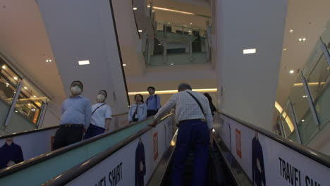 People-on-a-Escalator,-Sunway-Pyramid-Shopping-Mall-in-Kuala-Lumpur