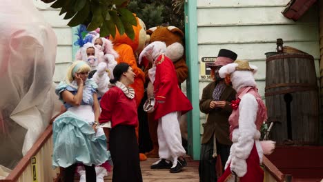 Performers-In-Funny-Costumes-Waiting-For-The-Show-To-Begin