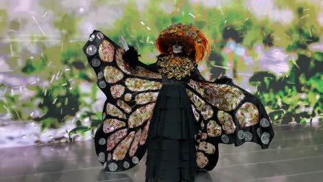 slow-motion-shot-of-person-dressed-as-mariposa-monarca