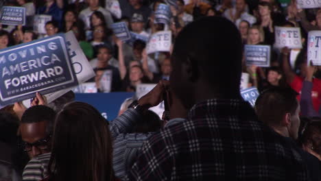 A-crowd-of-Democrat-supporters-listen-to-speakers-including-President-Obama-at-a-'Moving-America-Forward'-rally-at-Orr-Middle-School-in-Las-Vegas