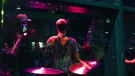 looking-through-the-window-of-a-band-performing-great-New-Orleans-styles-music