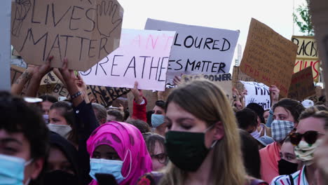 Protesting-young-people-walking-straight-towards-the-camera