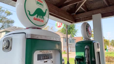 Vintage-green-Sinclair-gasoline-pumps-at-an-old-service-station--02