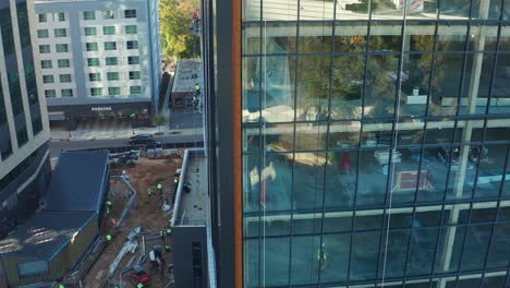 Construction-workers-at-a-bustling-multi-story-job-site