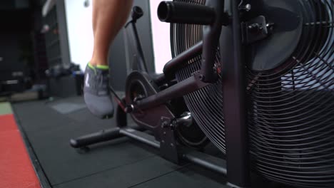 A-young-man-is-doing-his-cardio-exercise-in-the-health-club-after-his-workout-session