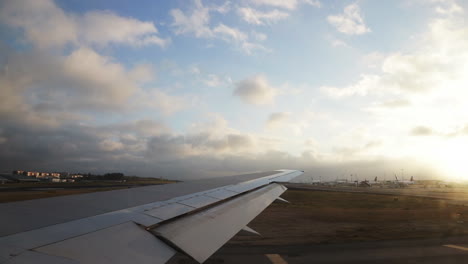 Plane-preparing-to-take-off-on-the-Lisbon-airport-in-the-morning