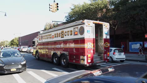 An-ambulance-drives-through-the-picture-while-a-couple-is-out-at-night