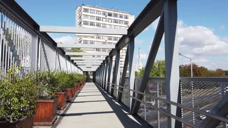 Walk-on-empty-pedestrian-overpass---a-massive-footbridge-over-a-roundabout-on-Trapezitsa-Square-in-Burgas-city