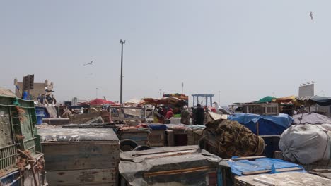 Panning-view-of-the-busy-Essaouira-Harbor-in-Morocco-from-behind-the-scenes