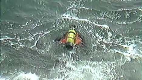 RESCUE-DIVERS-GOING-JUMPING-INTO-THE-OCEAN-FROM-1980S