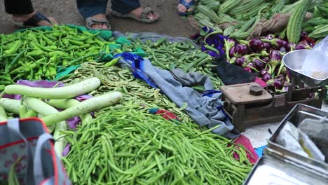 local-vegetables-market,-old-woman-venders-sell-their-vegetables-into-local-market,-close-up-shoot-of-vegetables