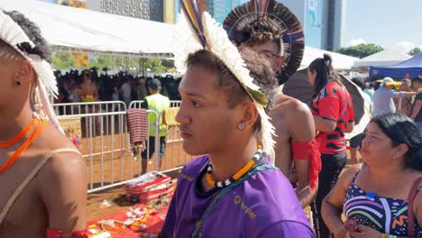 Local-indigenous-Amazon-people-with-their-traditional-body-drawings-and-colorful-feathered-hats