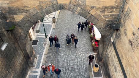 Charles-Bridge-from-above-during-the-day-in-the-winter-with-people-moving-4K-30-FPS