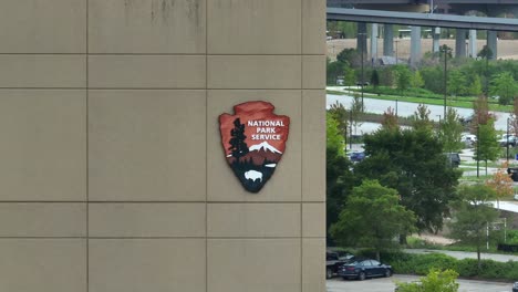 National-Park-Service-badge-on-cement-office-building