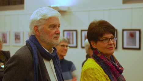 Male-and-female-couple-with-like-minded-scarves-enjoy-evening-out