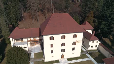 Drone-forward-flying-view-of-Strmol-castle,-Slovenia