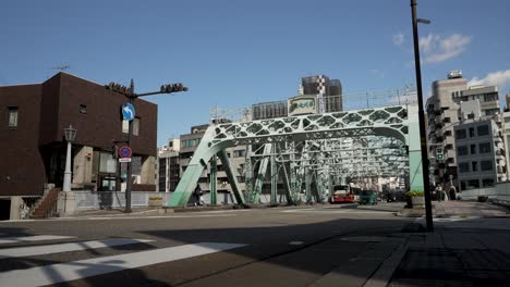 Traffic-Going-Through-Saigawa-Ohashi-Bridge-In-Kanazawa,-Japan-Along-National-Route-157