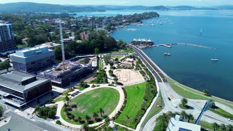 Drone-aerial-park-crane-construction-waterfront-foreshore-Drifters-Wharf-Brisbane-Water-Gosford-city-travel-tourism-Central-Coast-Australia-4K