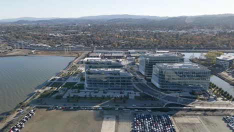 Stunning-drone-shot-over-Meta-Reality-Labs,-capturing-the-synergy-between-innovative-architecture-and-the-natural-landscape